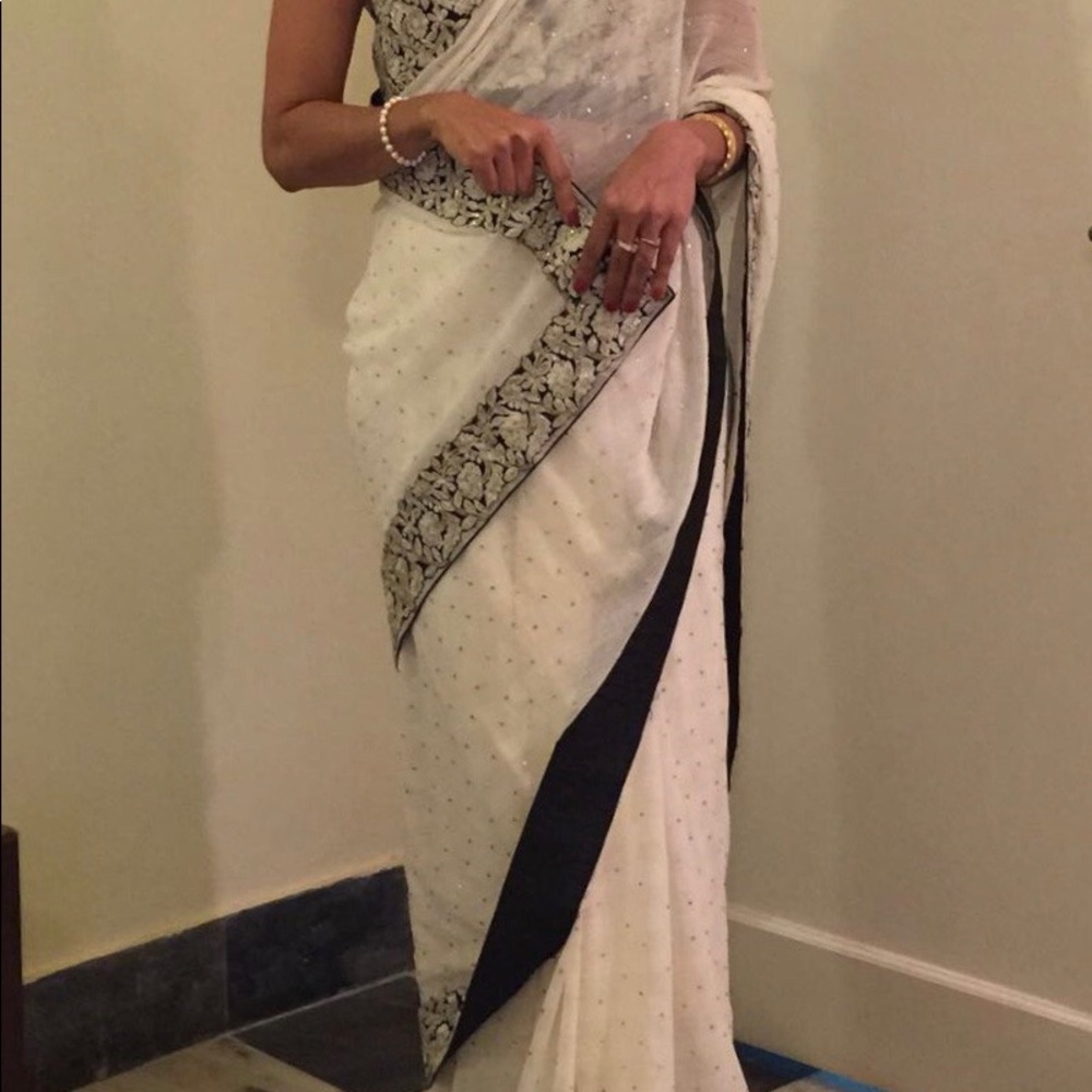 White chiffon Designer Saree with black embroidered blouse